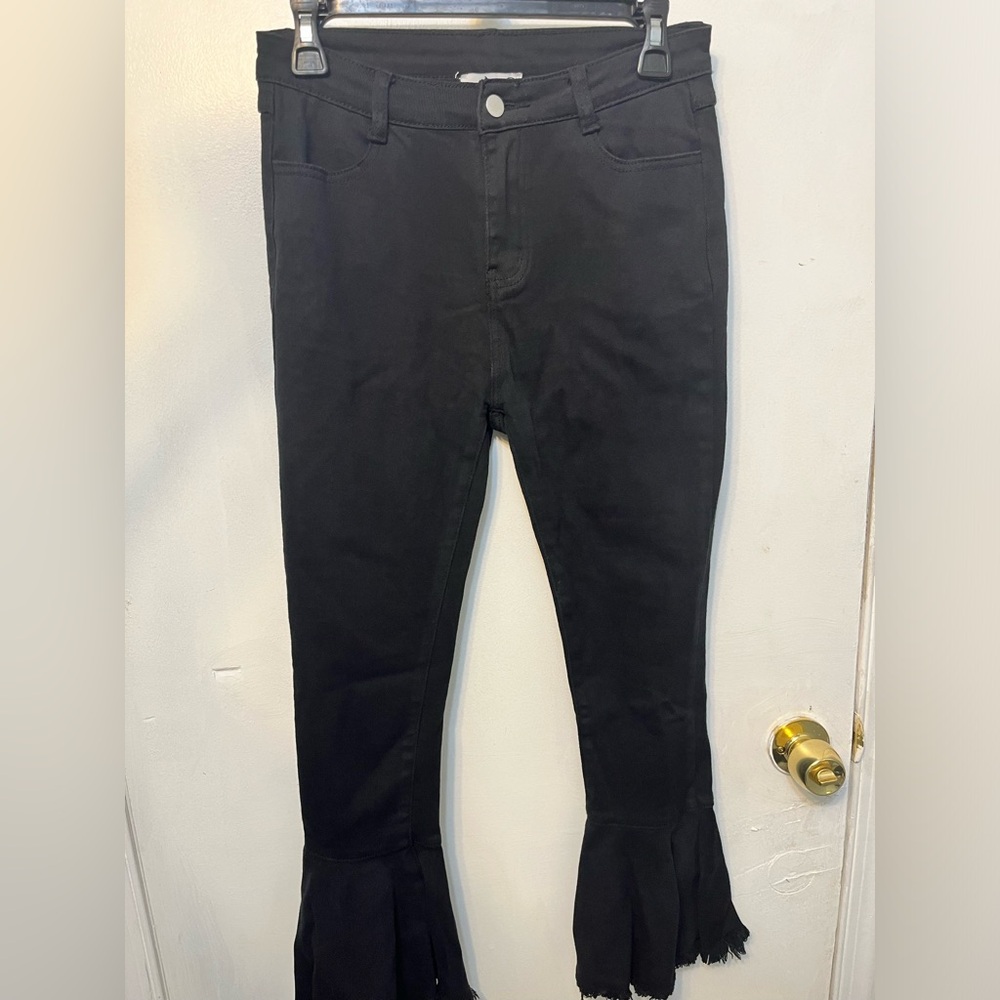 Black frill bottom jeans